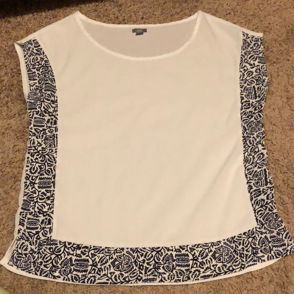 White and navy top
